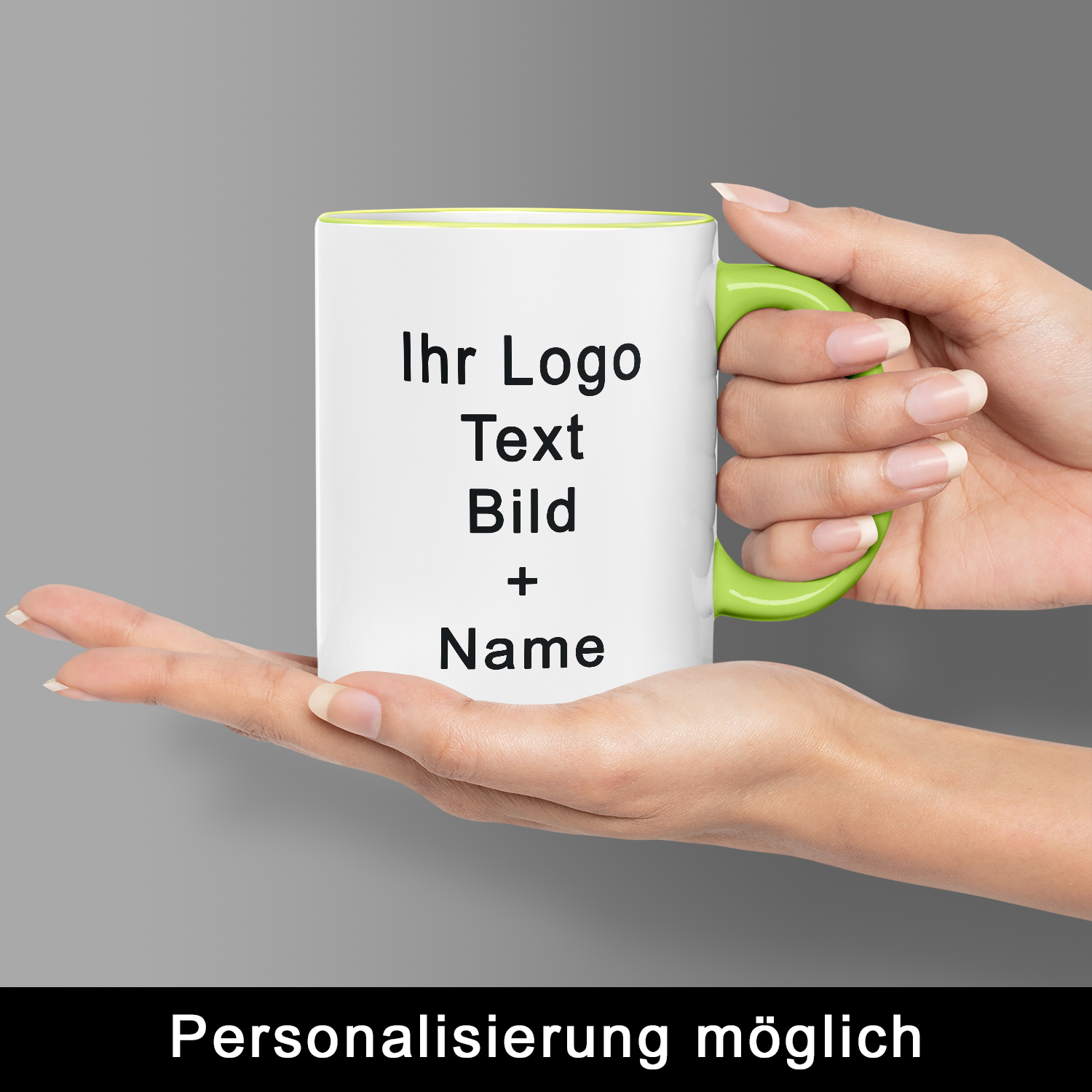 Tasse Max hellgrün – mit Namen personalisierbar Hände halten Tasse Max mit Henkel in Hellgrün, Aufschrift „Ihr Logo, Text, Bild + Name“ – Personalisierung möglich
